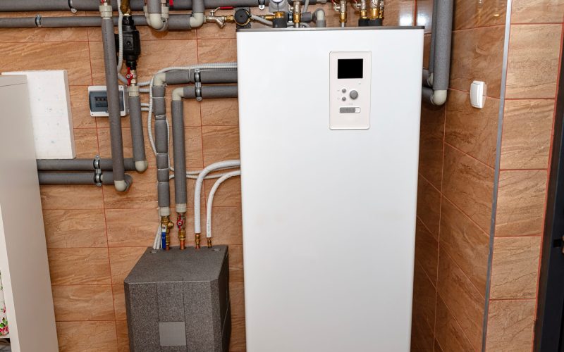 A,Modern,Air,Heat,Pump,Installed,In,The,Home's,Boiler